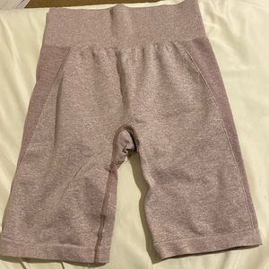 Pink Gymshark shorts.